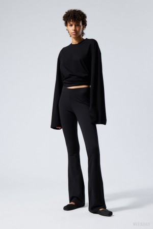 Weekday Flared Jersey Trousers Czarne | TWZE3299